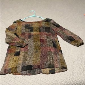 Quarter sleeve blouse with back design.